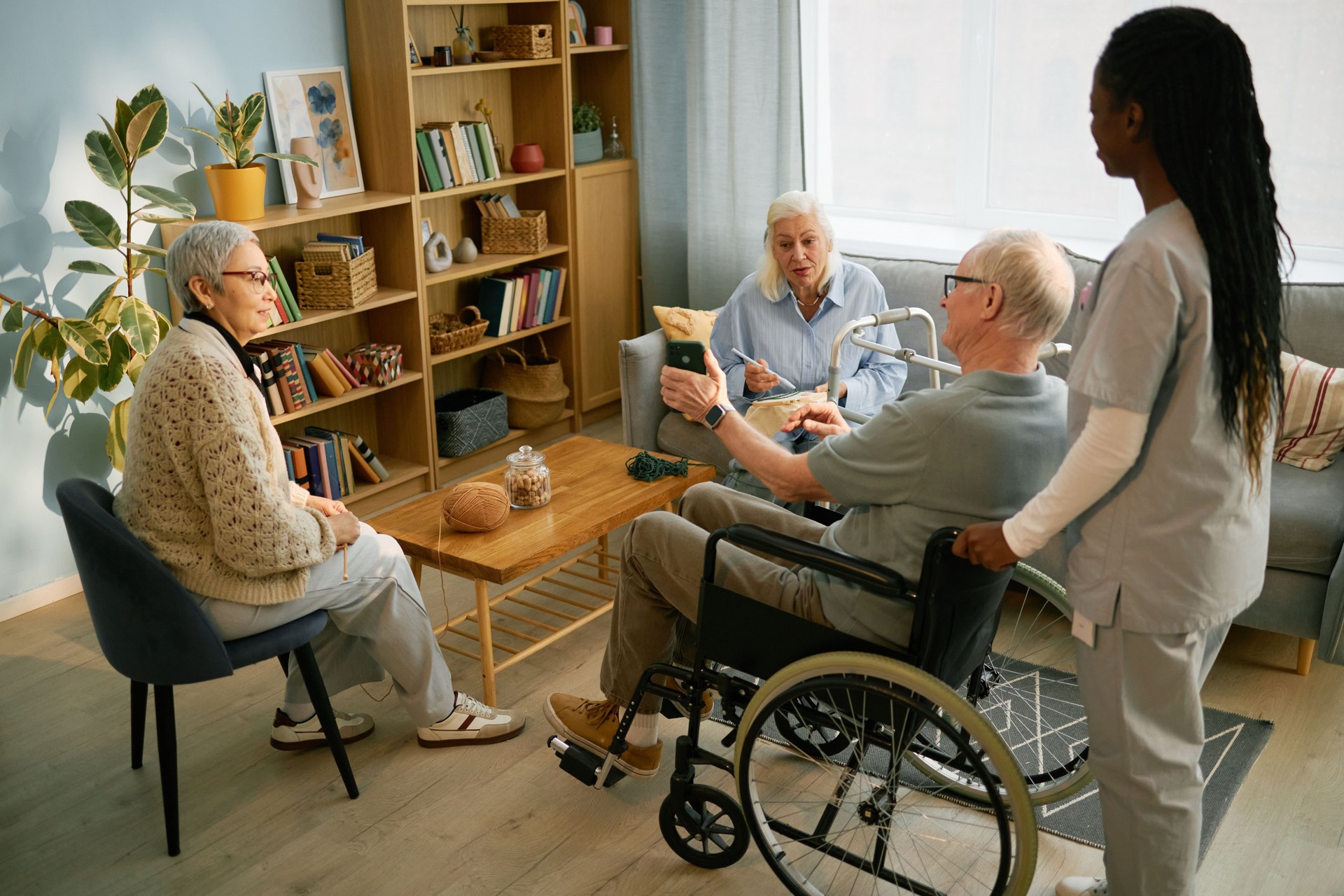 Group of Seniors Engaging in Social Activity in Room